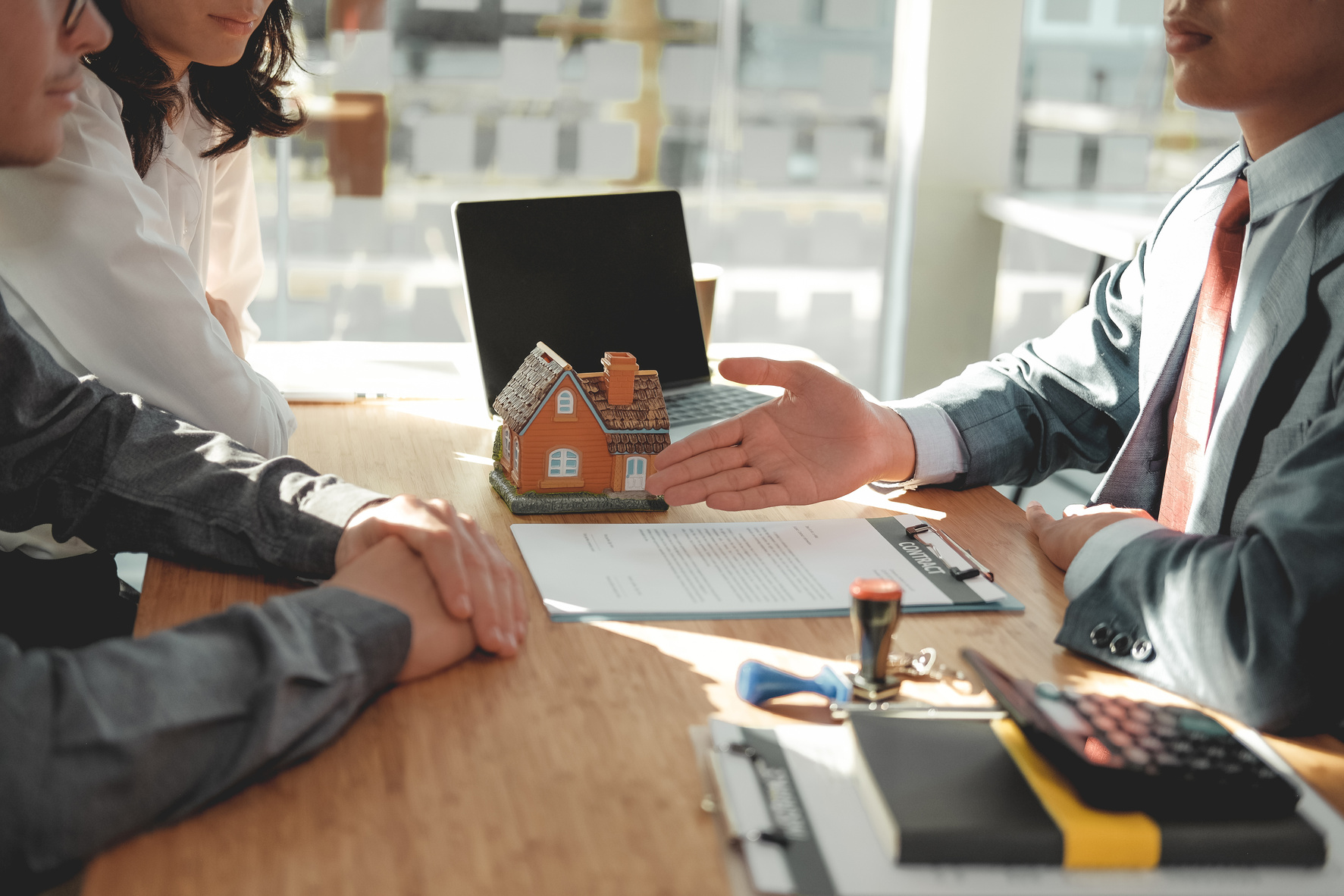 Lawyer Insurance Broker Consulting Giving Legal Advice to Couple